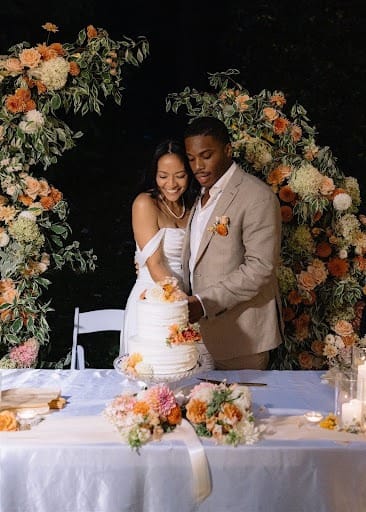 Wedding couple cuts wedding cake